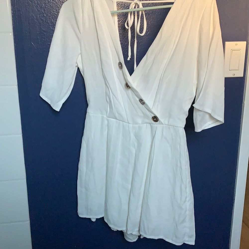 BARELY WORN WHITE ROMPER FROM TRIXXI